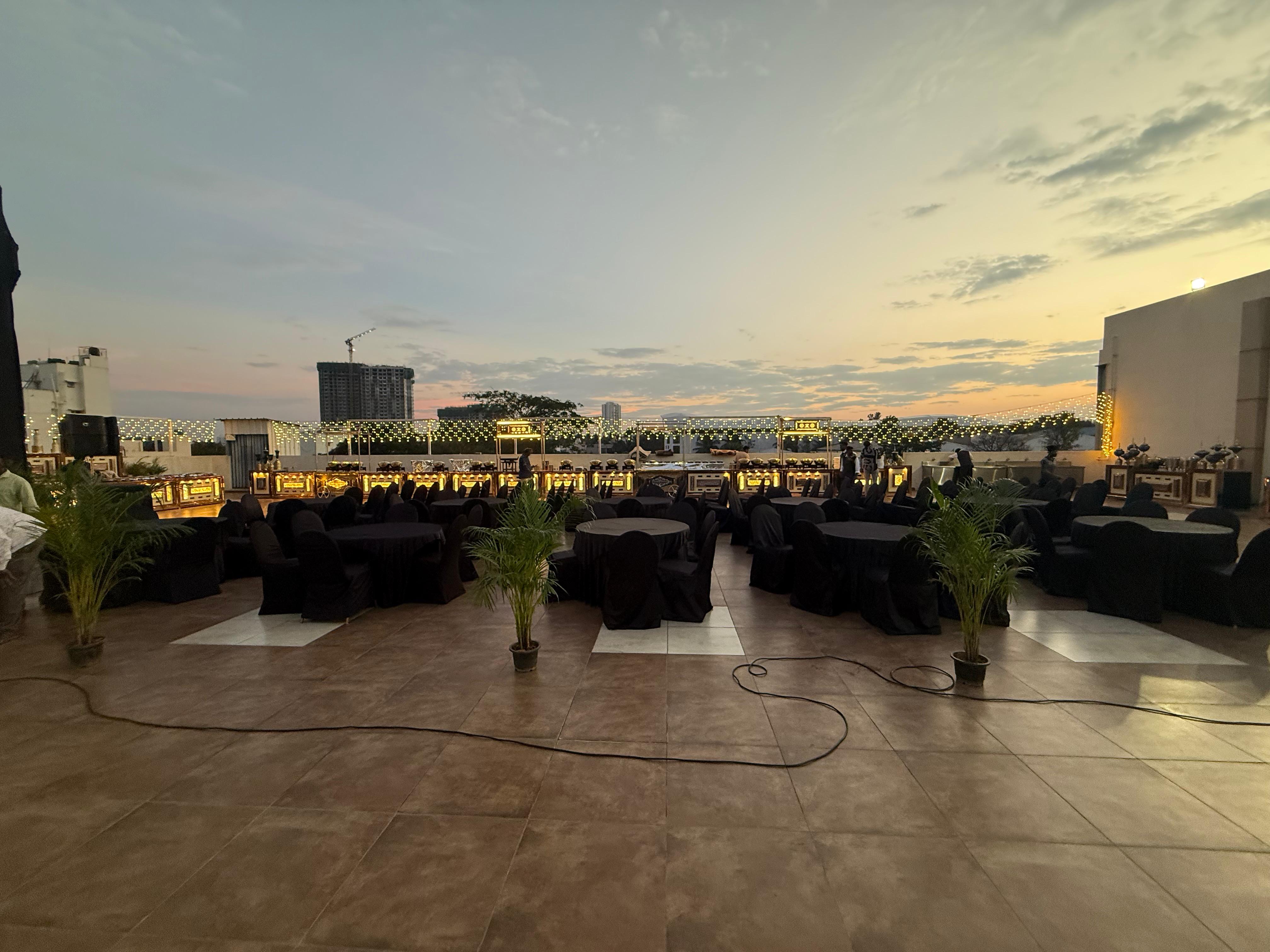 Couple dancing under canopy lights